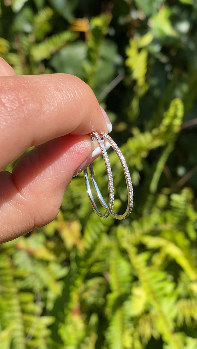 9K gold diamond hoop earrings.