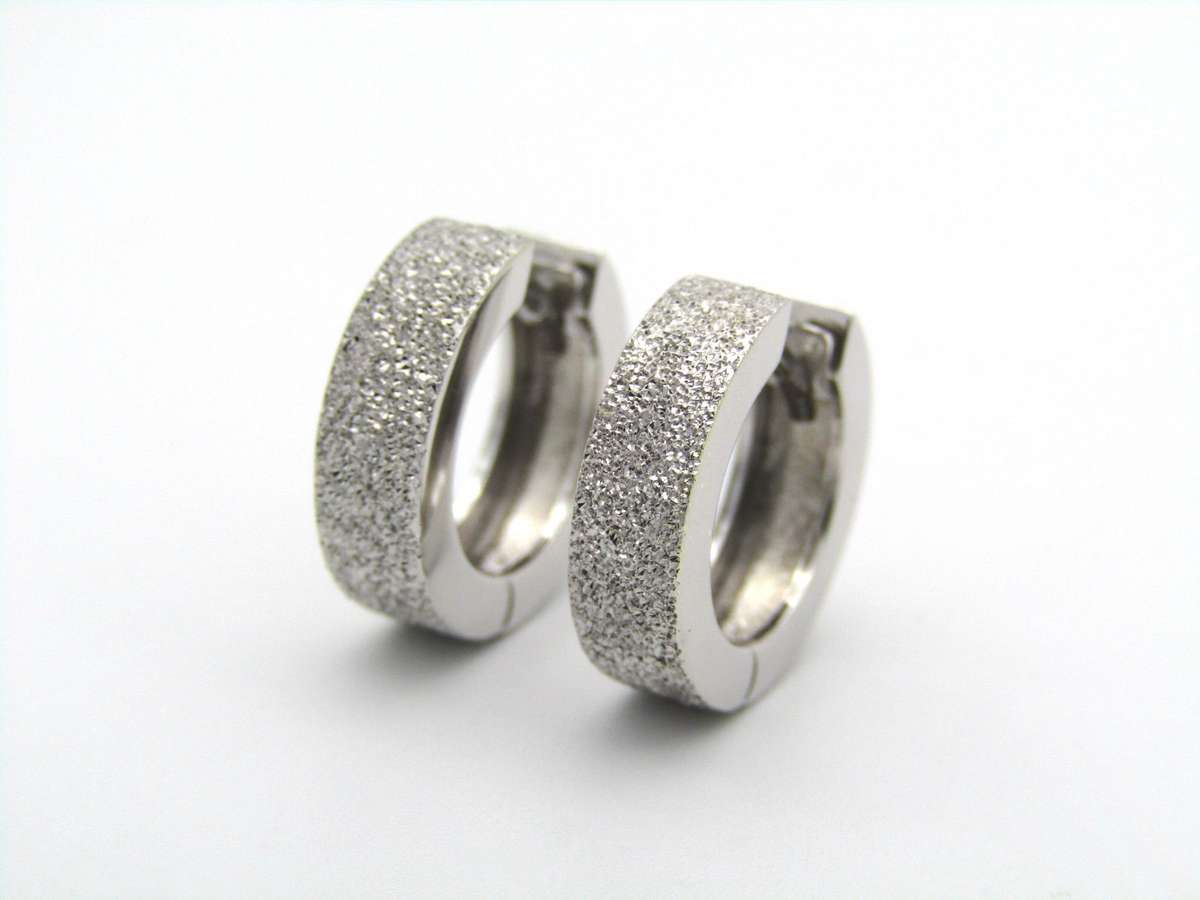 9K gold huggie earrings.