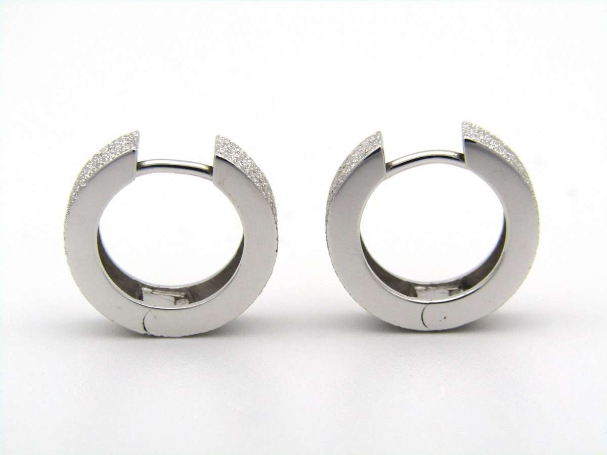 9K gold huggie earrings.