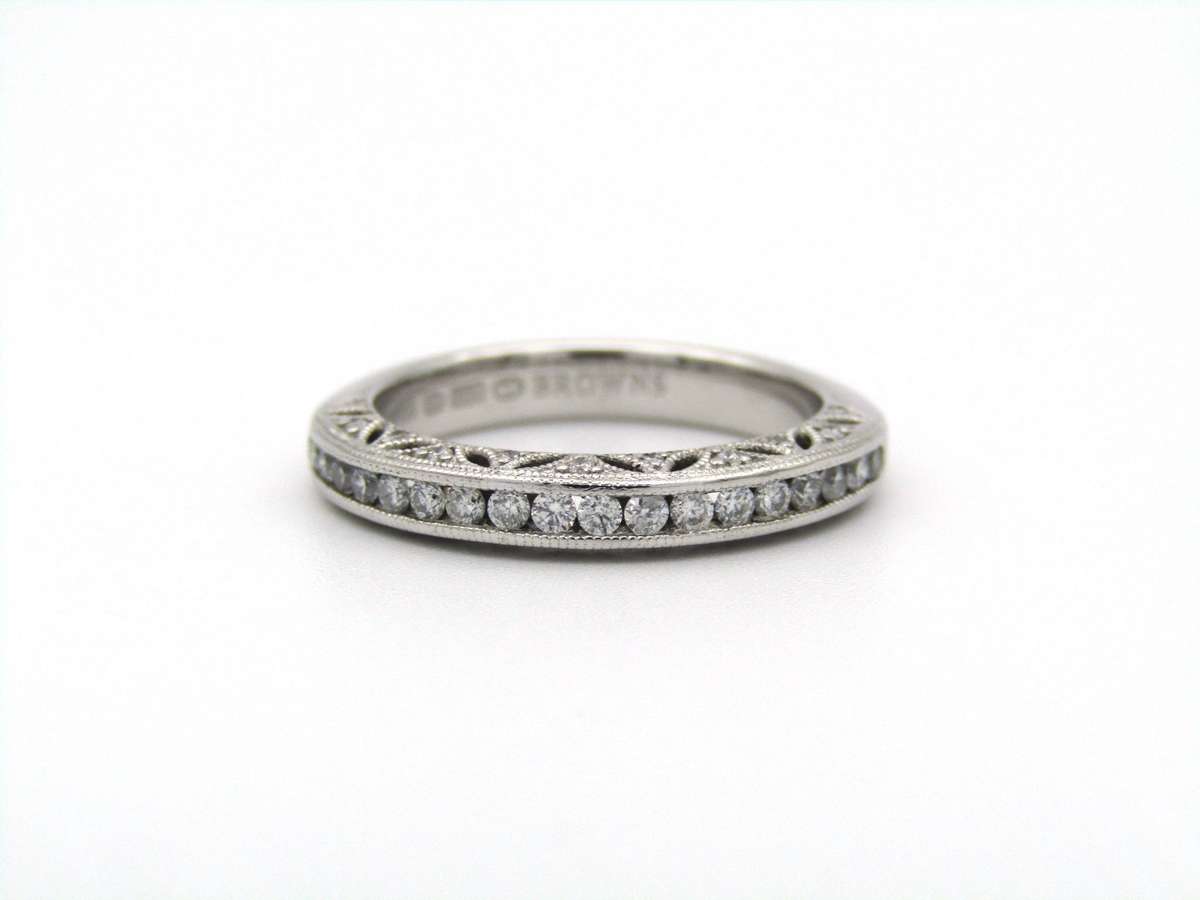 18K gold 1934 half eternity ring by Browns.