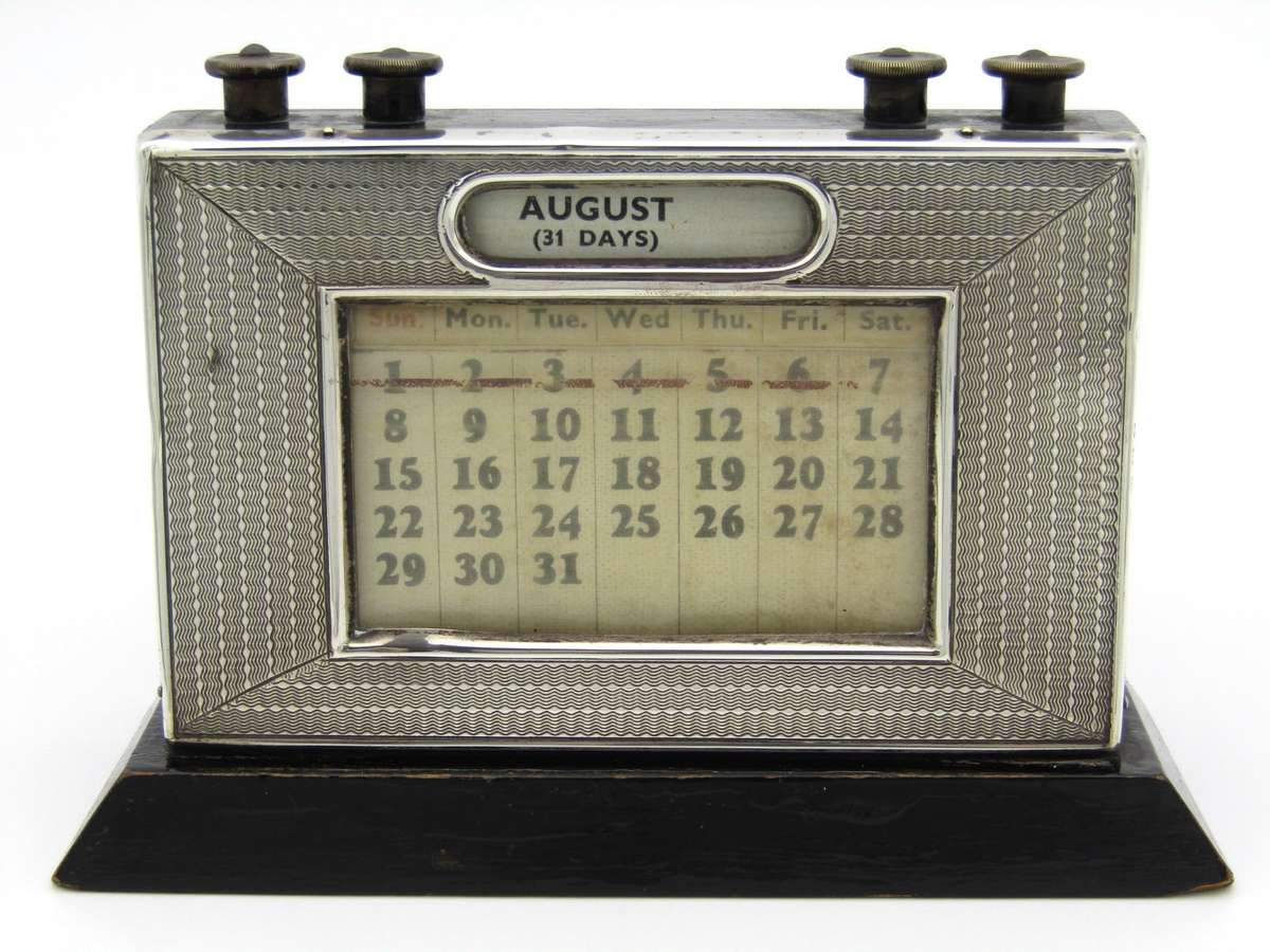 Art Deco silver desk calendar by W.J. Myatt & Co., Birmingham 1933.