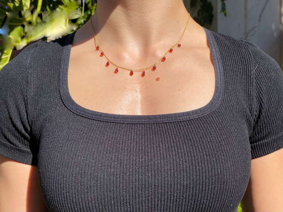 18K gold garnet necklace.