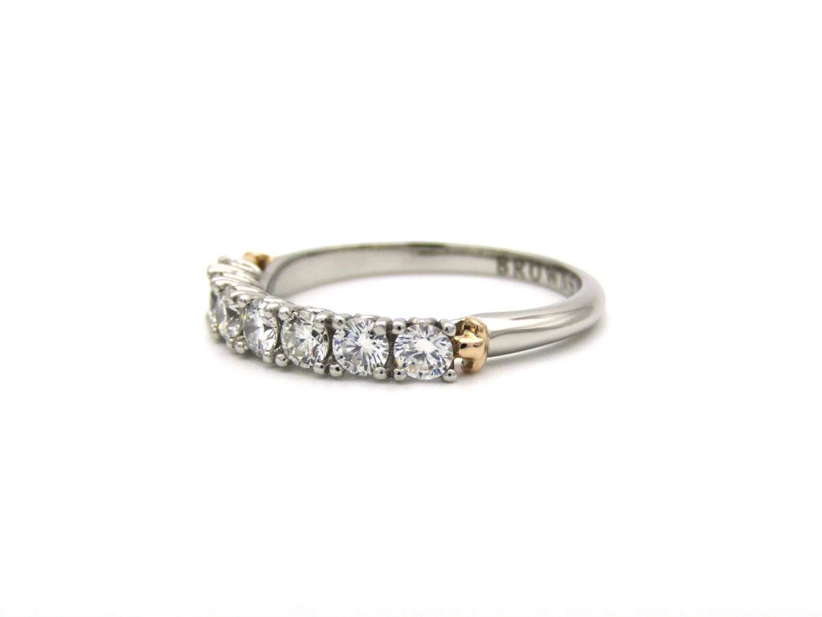 Platinum and 18K gold diamond Protea half eternity ring by Browns.