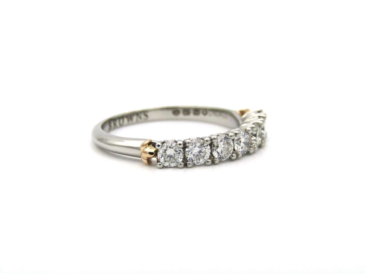Platinum and 18K gold diamond Protea half eternity ring by Browns.