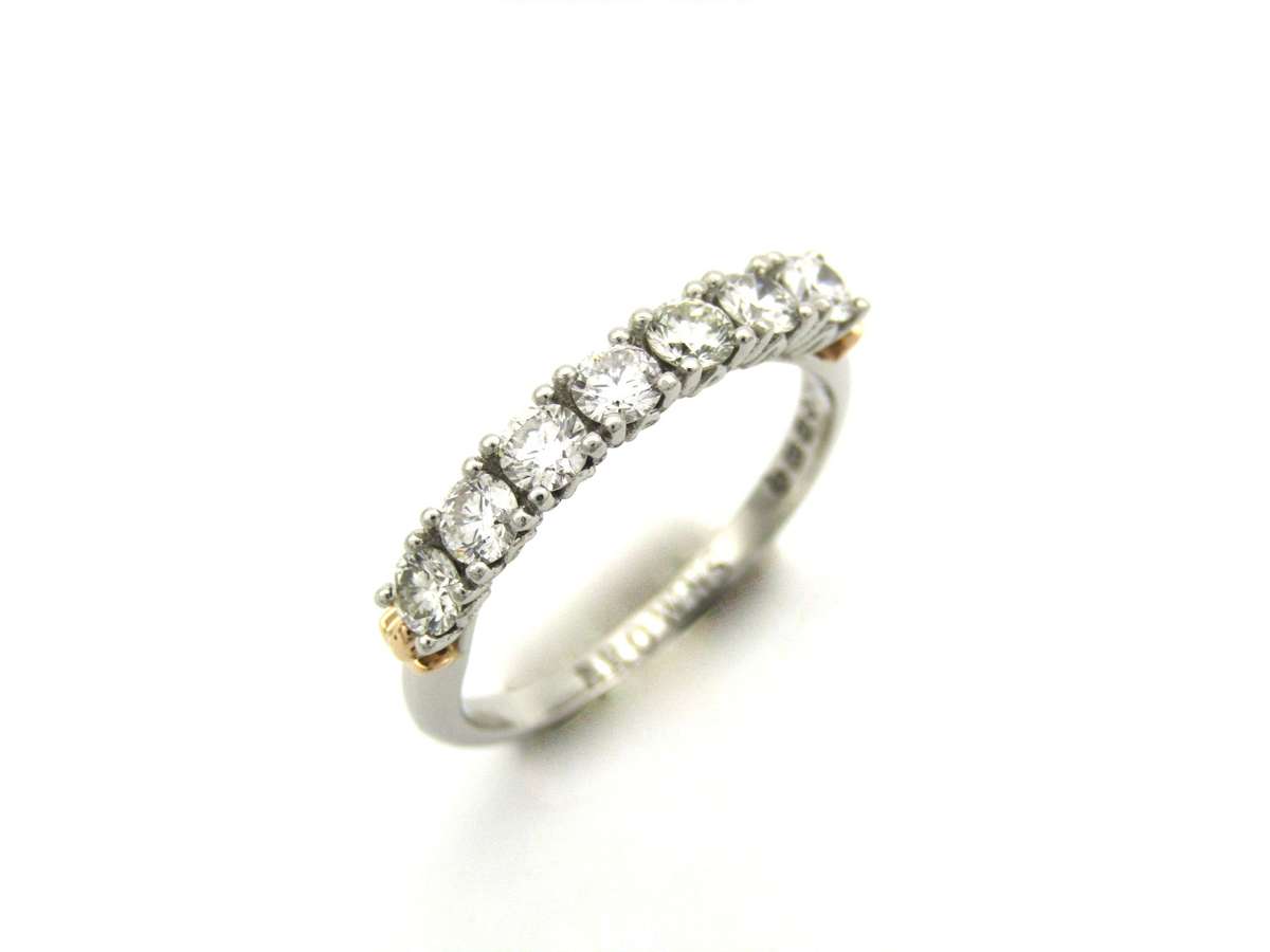 Platinum and 18K gold diamond Protea half eternity ring by Browns.