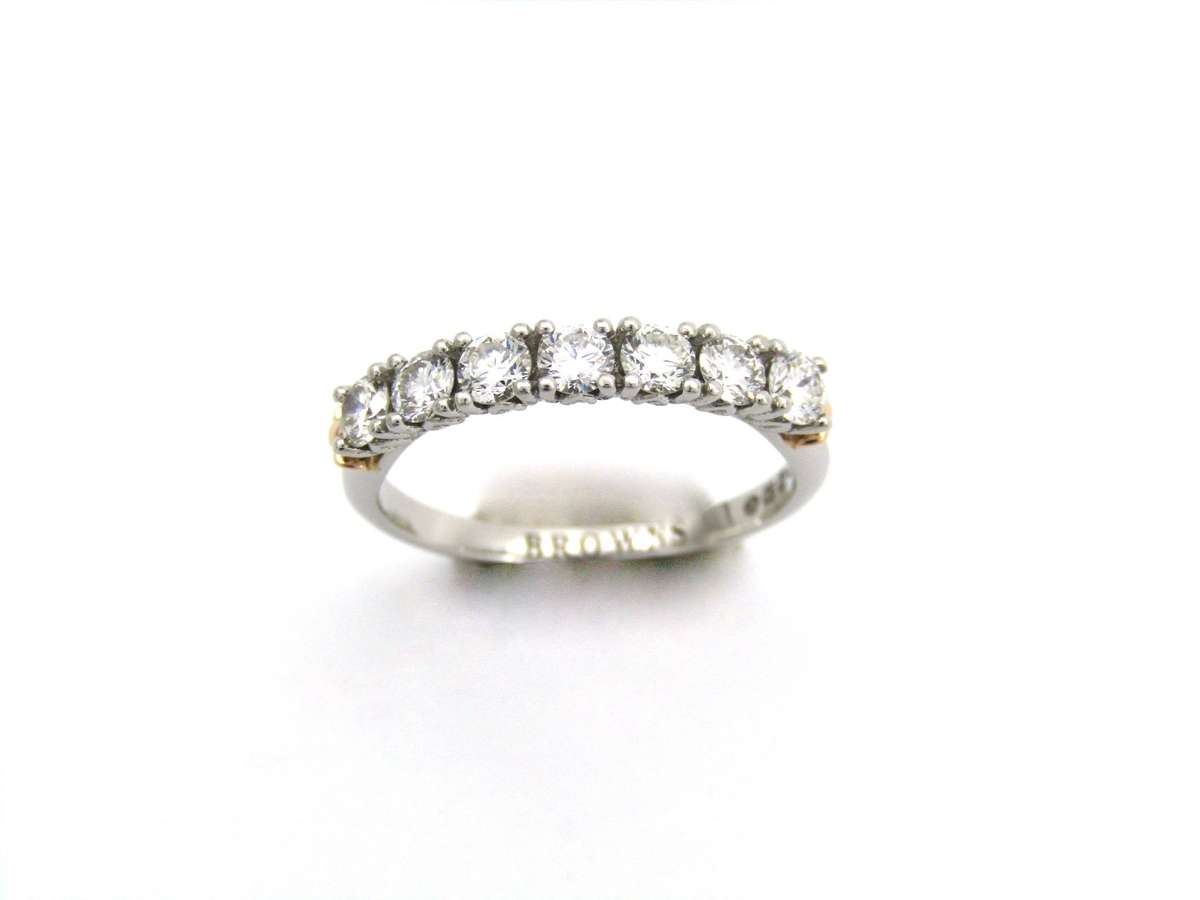 Platinum and 18K gold diamond Protea half eternity ring by Browns.