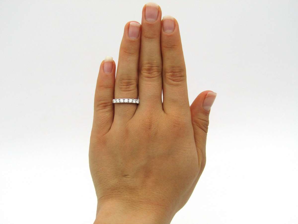 Platinum and 18K gold diamond Protea half eternity ring by Browns.