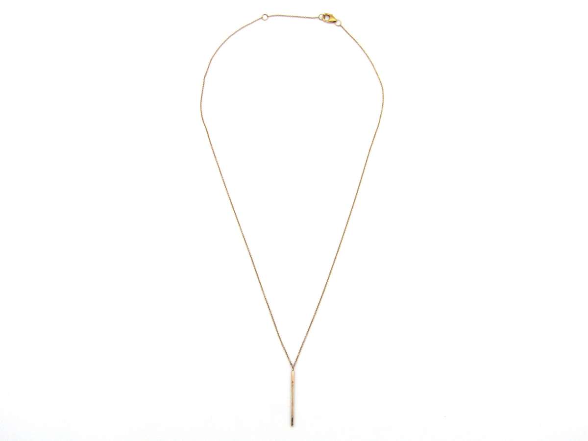 9K gold diamond bar necklace.