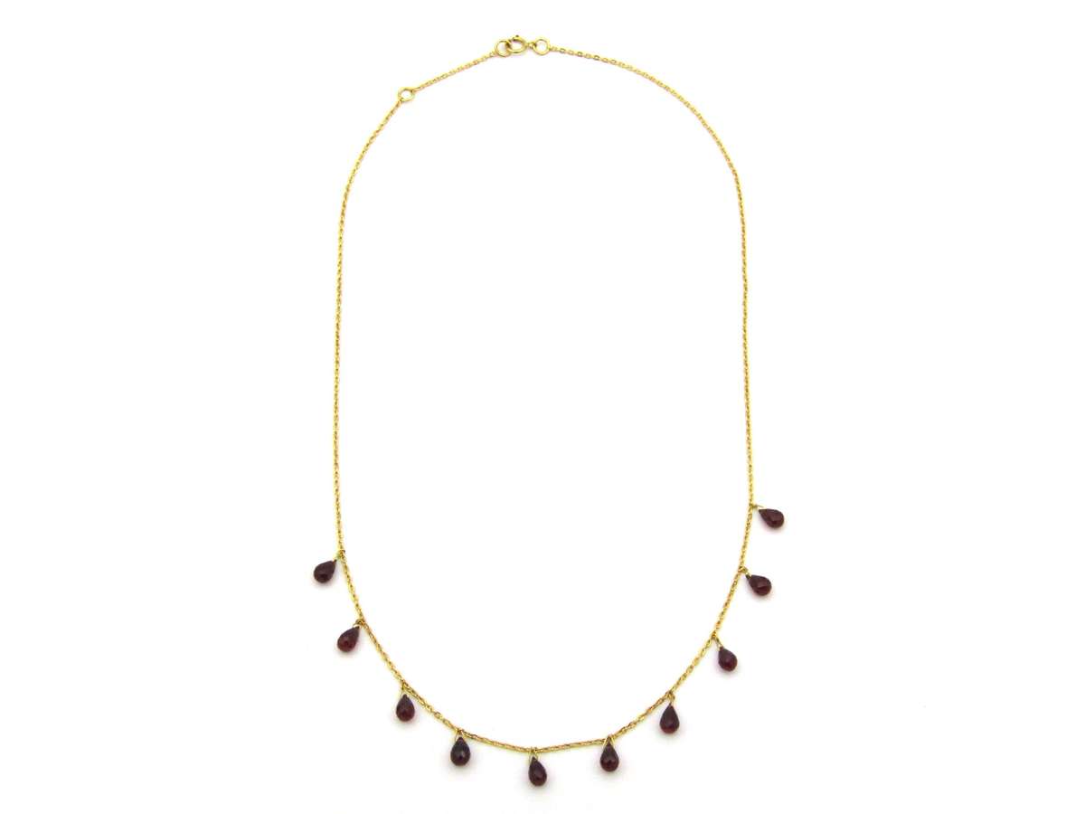 18K gold garnet necklace.