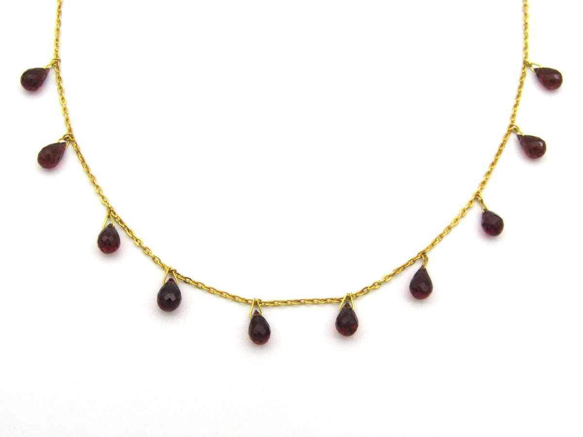 18K gold garnet necklace.