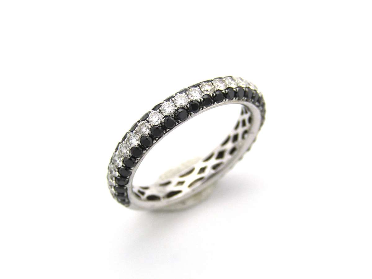 18K gold black and colourless diamond ring.