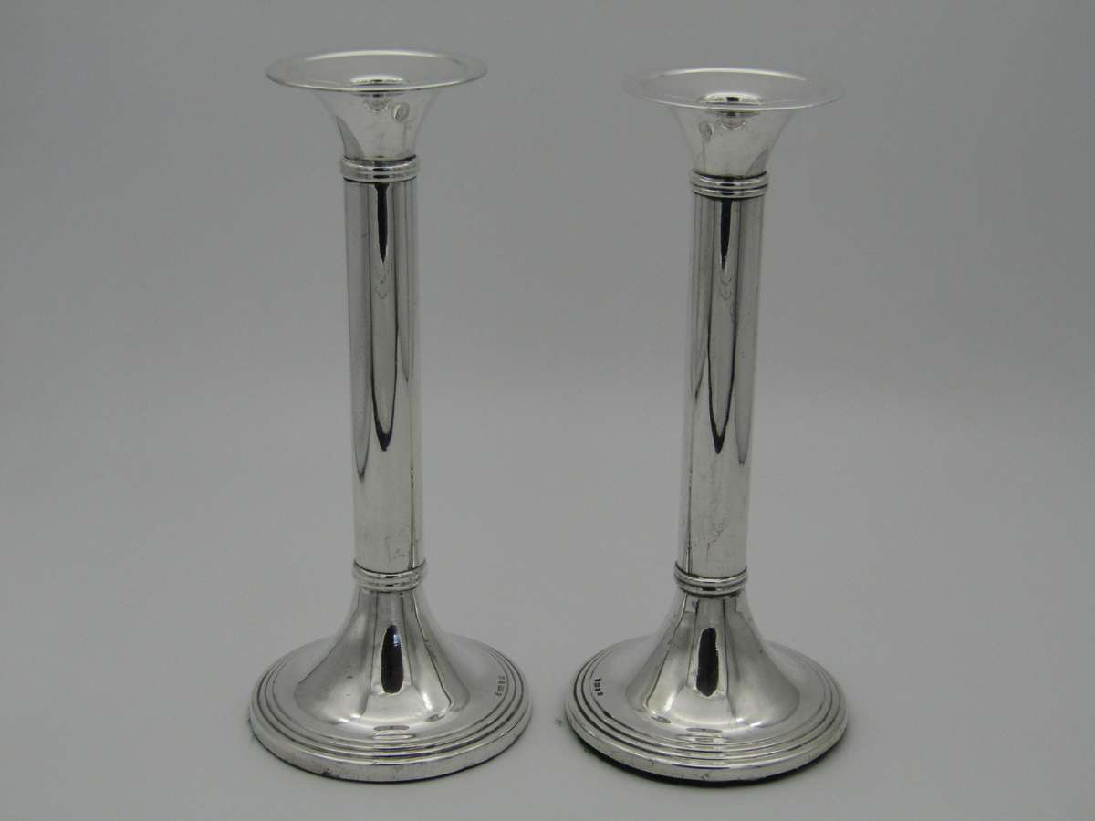 Pair of South African sterling silver candlesticks, made in 1994.