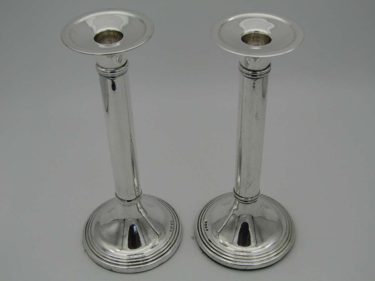 Pair of South African sterling silver candlesticks, made in 1994.