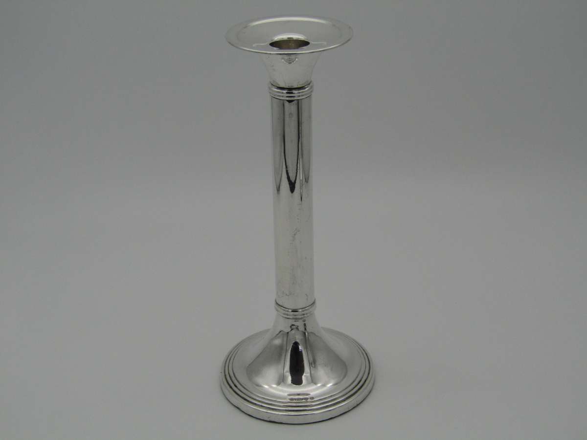 Pair of South African sterling silver candlesticks, made in 1994.