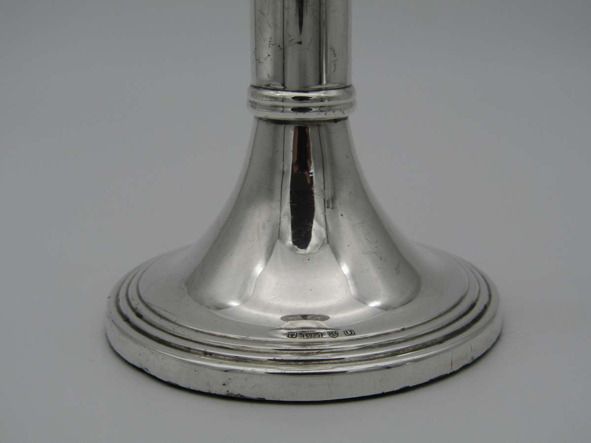 Pair of South African sterling silver candlesticks, made in 1994.