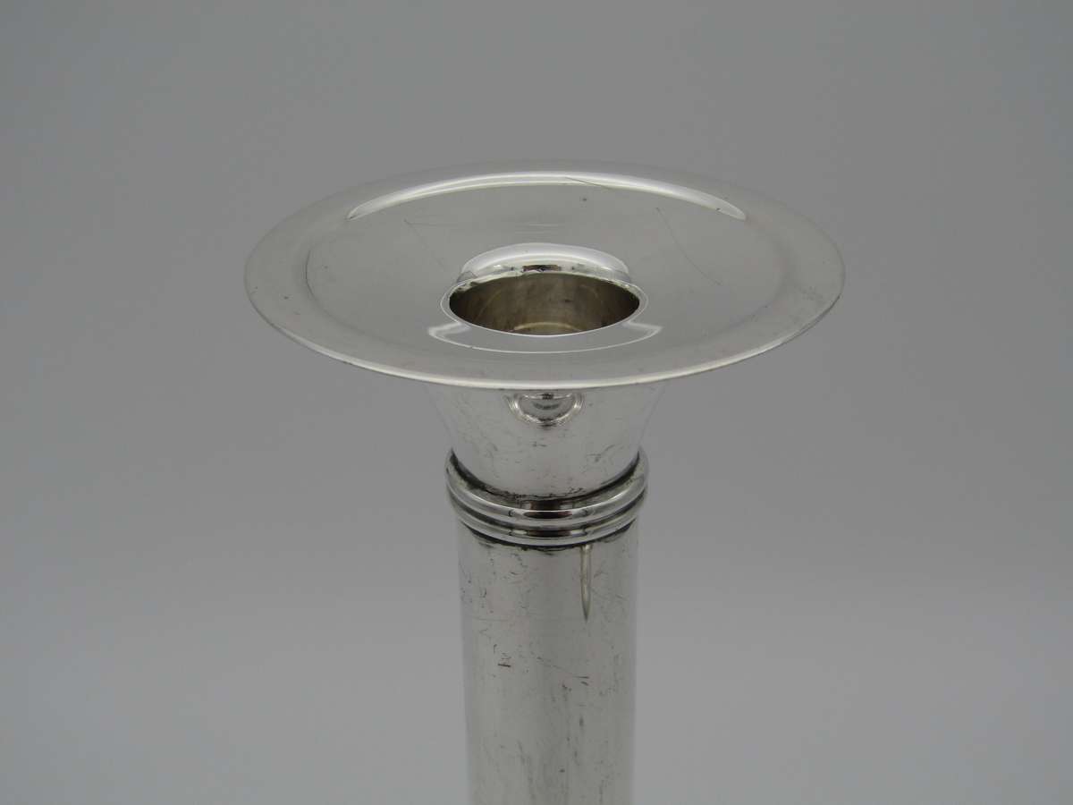 Pair of South African sterling silver candlesticks, made in 1994.
