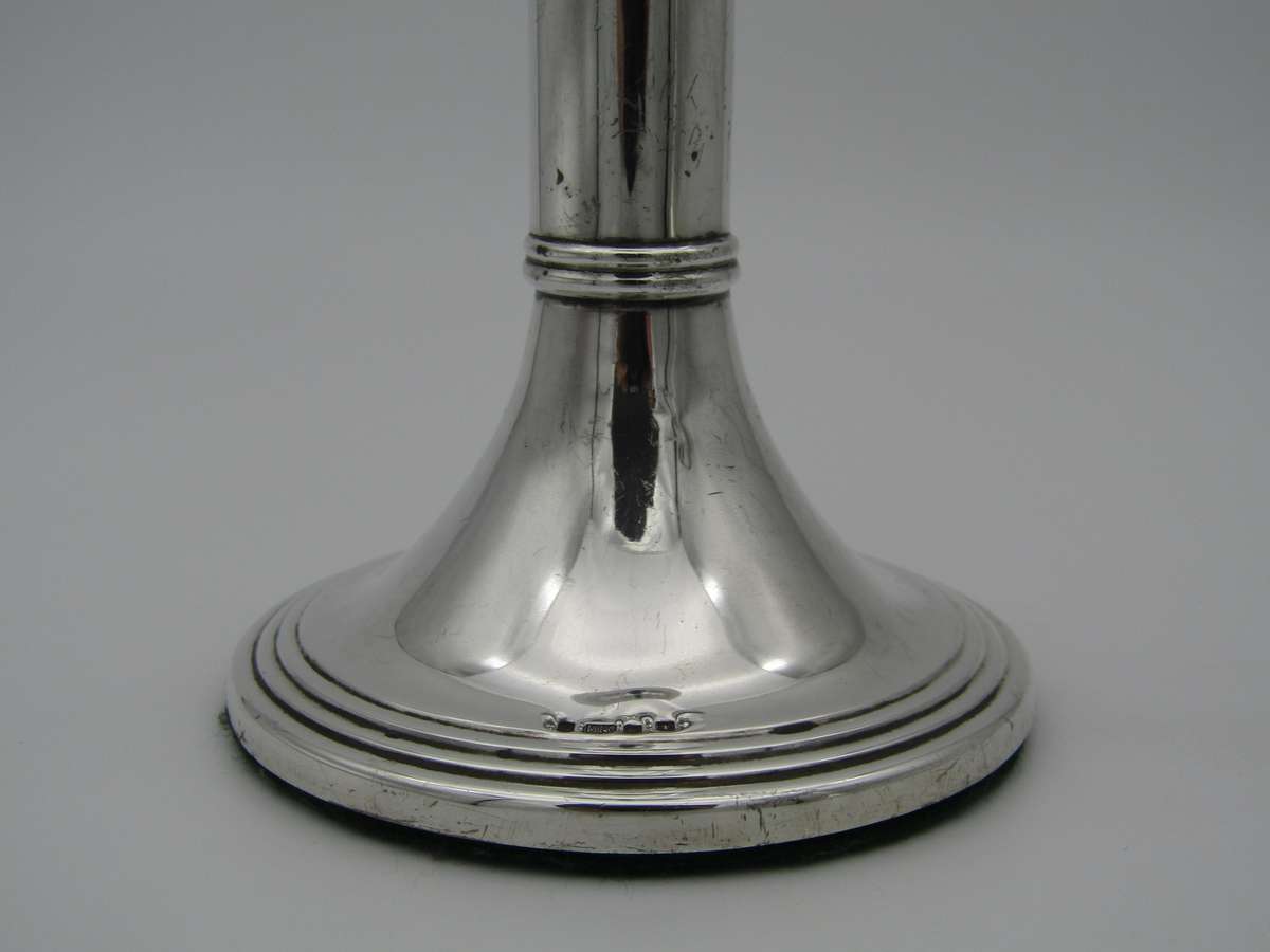 Pair of South African sterling silver candlesticks, made in 1994.