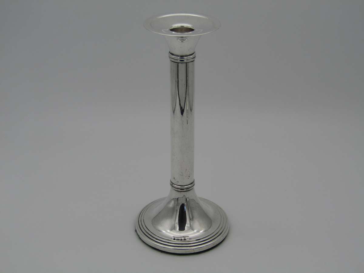 Pair of South African sterling silver candlesticks, made in 1994.