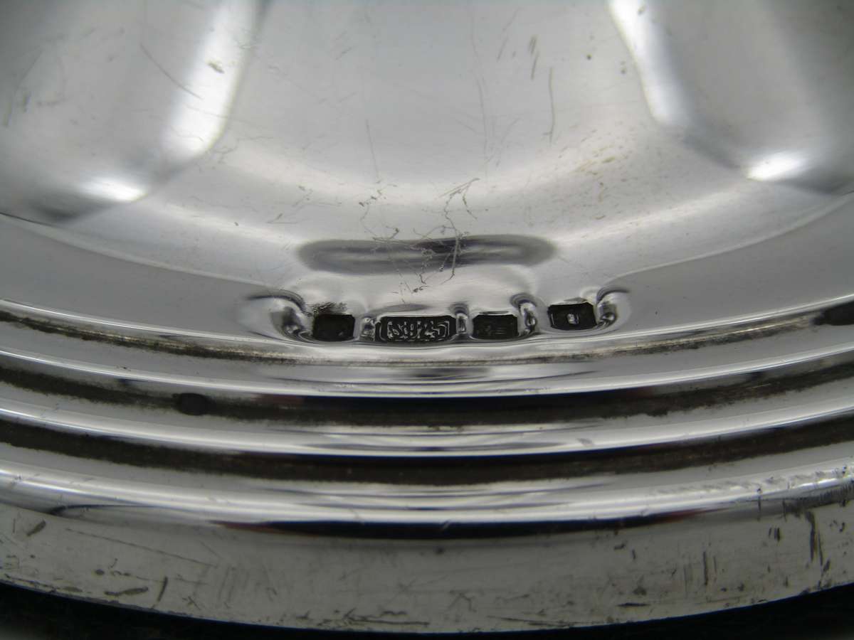 Pair of South African sterling silver candlesticks, made in 1994.