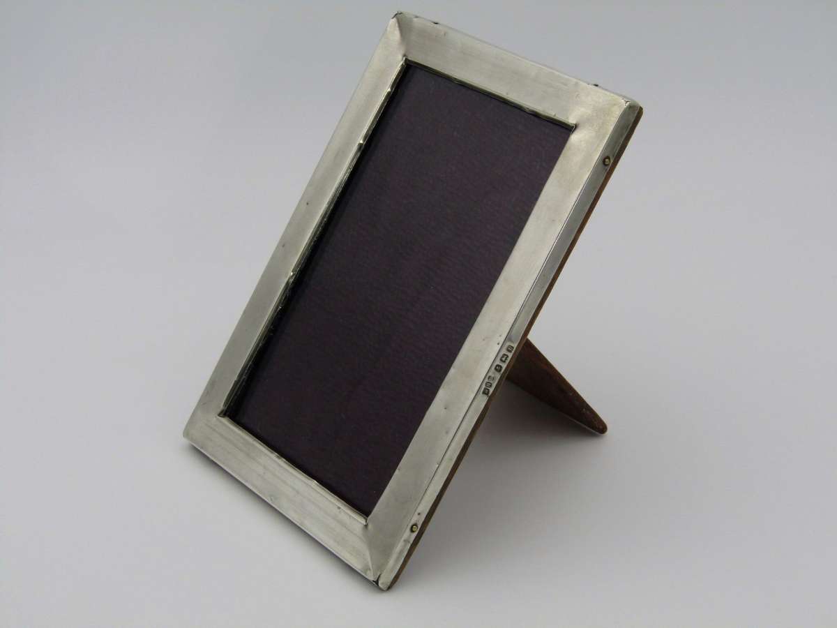 A sterling silver picture frame. Made in Birmingham, 1918.