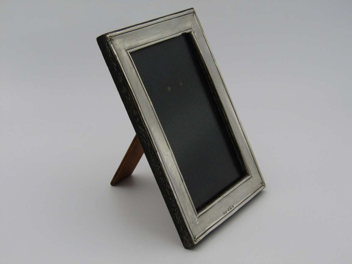 A sterling silver picture frame by Henry Williamson Ltd. Birmingham, 1912.
