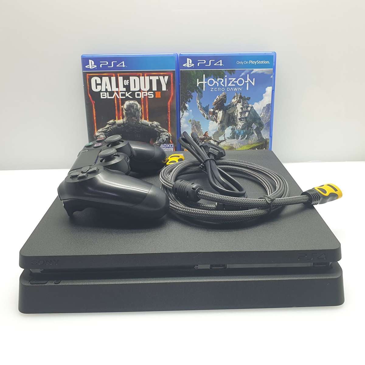 PlayStation 4 Slim 500GB Black (6 Month Warranty) + HDMI Cable + Power Cable + 1 Controller + 2 G...