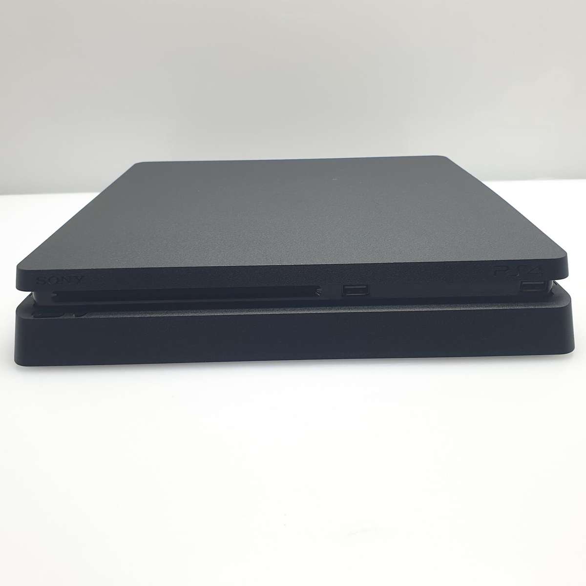 PlayStation 4 Slim 500GB Black (6 Month Warranty) + HDMI Cable + Power Cable + 1 Controller + 2 G...