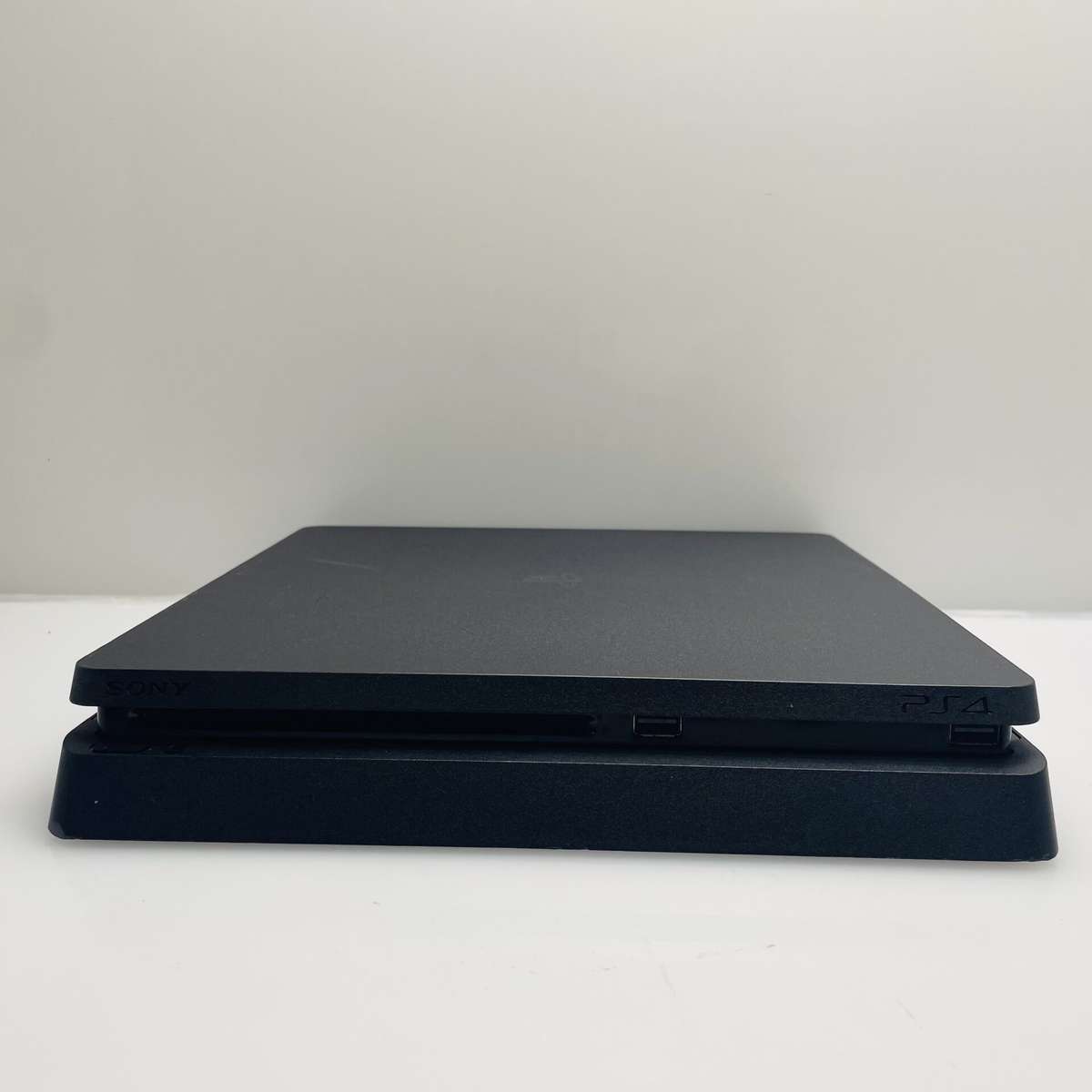 PlayStation 4 Slim 500GB Black + 1 Controller + HDMI Cable + Power Cable + 2 Games (Grade B)