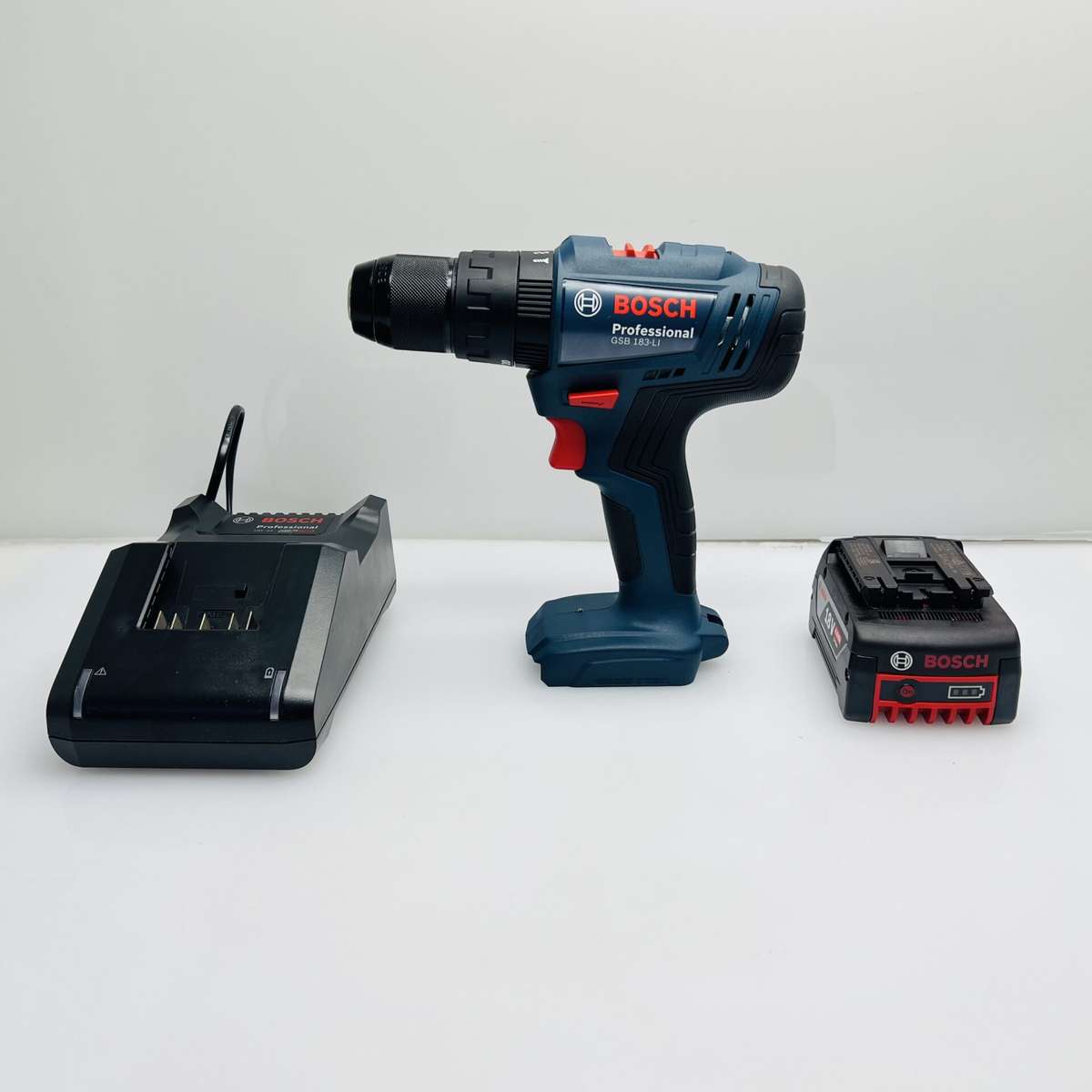 Bosch Professional GSB 183-LI cordless impact Drill Blue + Bosch 18V Battery + Bosch Battery Char...