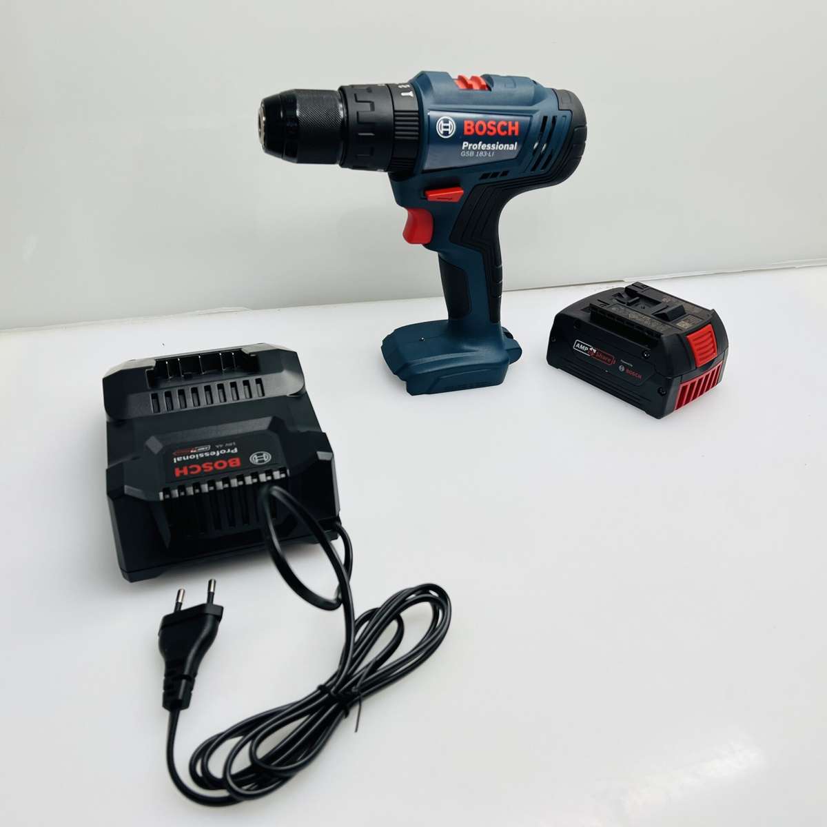 Bosch Professional GSB 183-LI cordless impact Drill Blue + Bosch 18V Battery + Bosch Battery Char...