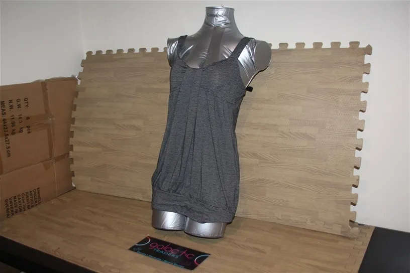 Black and white striped tank top, size and material not shown, seems cotton and medium