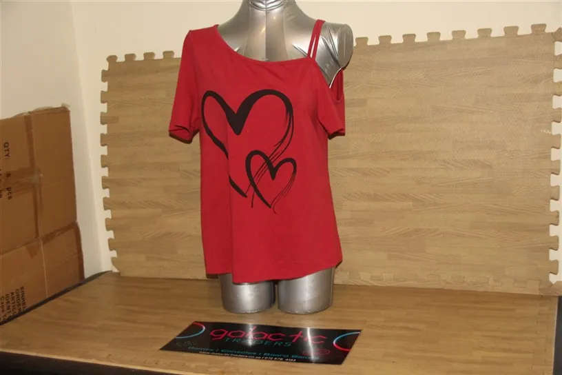 Women's red off-shoulder t-shirt with a black heart graphic print