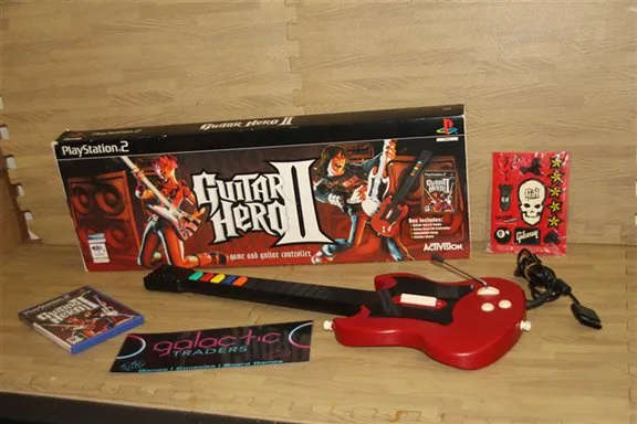 PS2 Guitar Hero guitar controller in original box with game