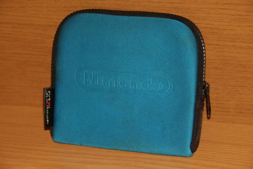 Nintendo 2DS carrying case in a vibrant teal blue colour