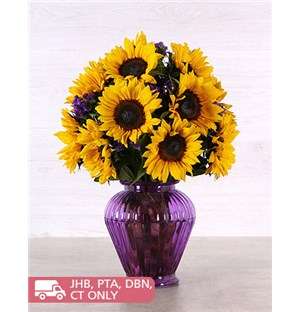 Sunflowers in a Purple Urn Vase