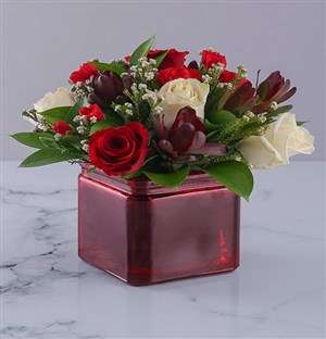 Vase of Red and Cream Roses
