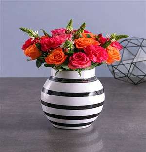 Delicate Flower Delights In Striped Vase