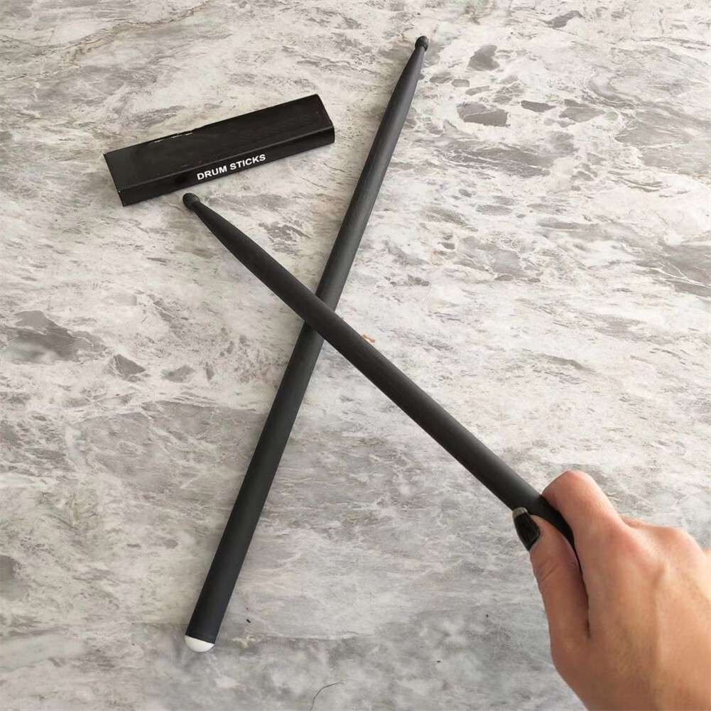 New Hot Sale Band Beat The Drums Drumsticks 5A Carbon Dia 0.565 Flexible