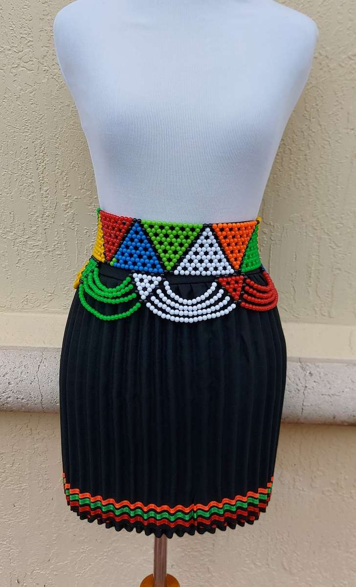 Women`s blackTraditional Zulu Skirt and Beaded Belt. Pleated Zulu women skirt