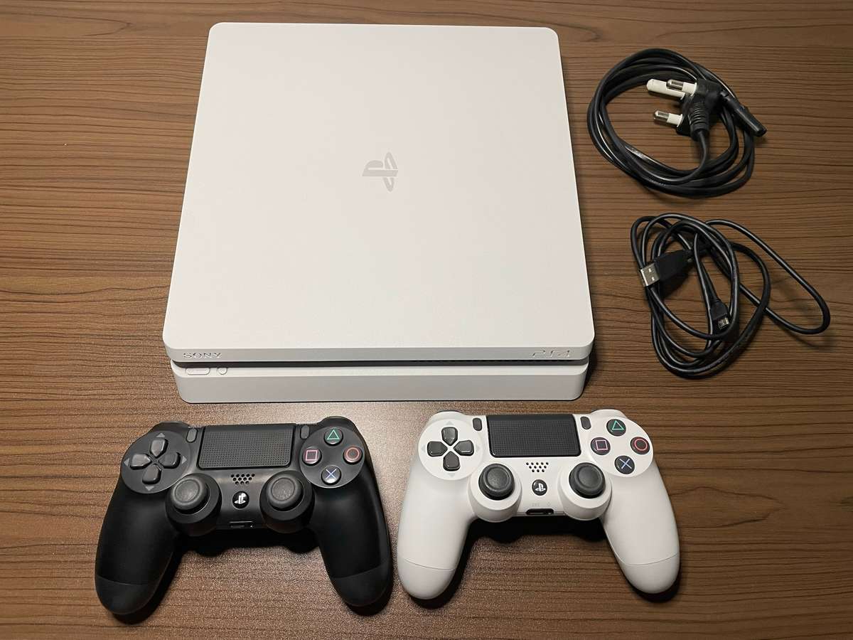 PlayStation 4 Slim 1TB Console (White) + 2 Controllers