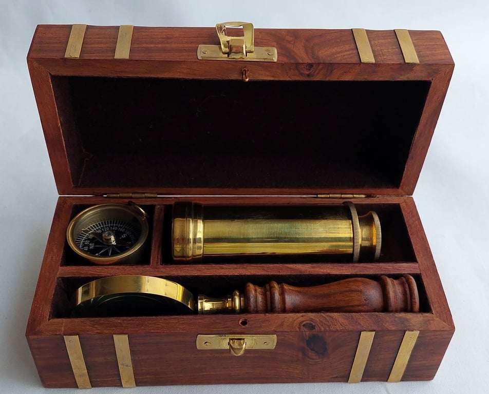 Decorative Nautical Set - Brass telescope, magnifying glass and compass in a wooden treasure chest