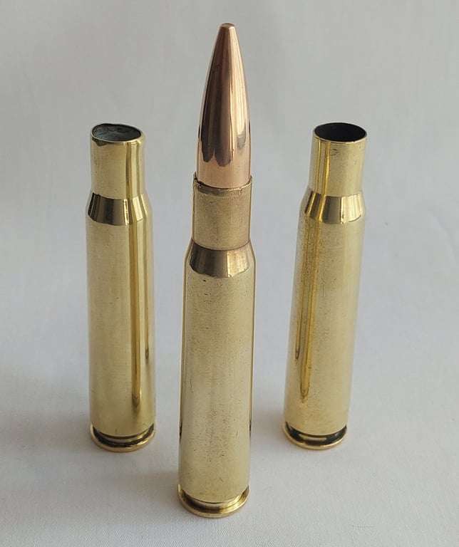 1 Set of 3 - Off Brass Shells - Caliber (12,7 mm) / .50 Browning - 2 off empty cartridges and 1 w...