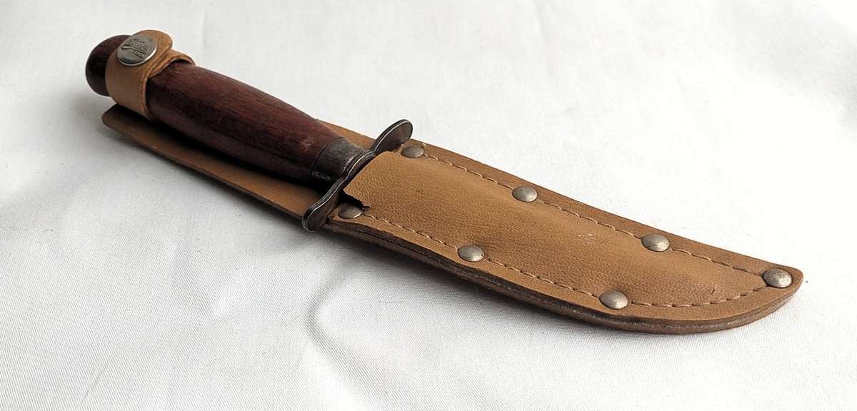 Collectable - Vintage Frosts Mora Knife in a leather sheath - Made in Sweden