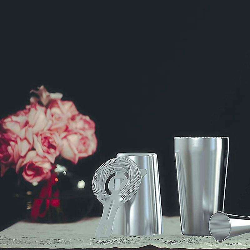 Cocktail Shaker Set: Cocktail Strainer and Jigger Set.
