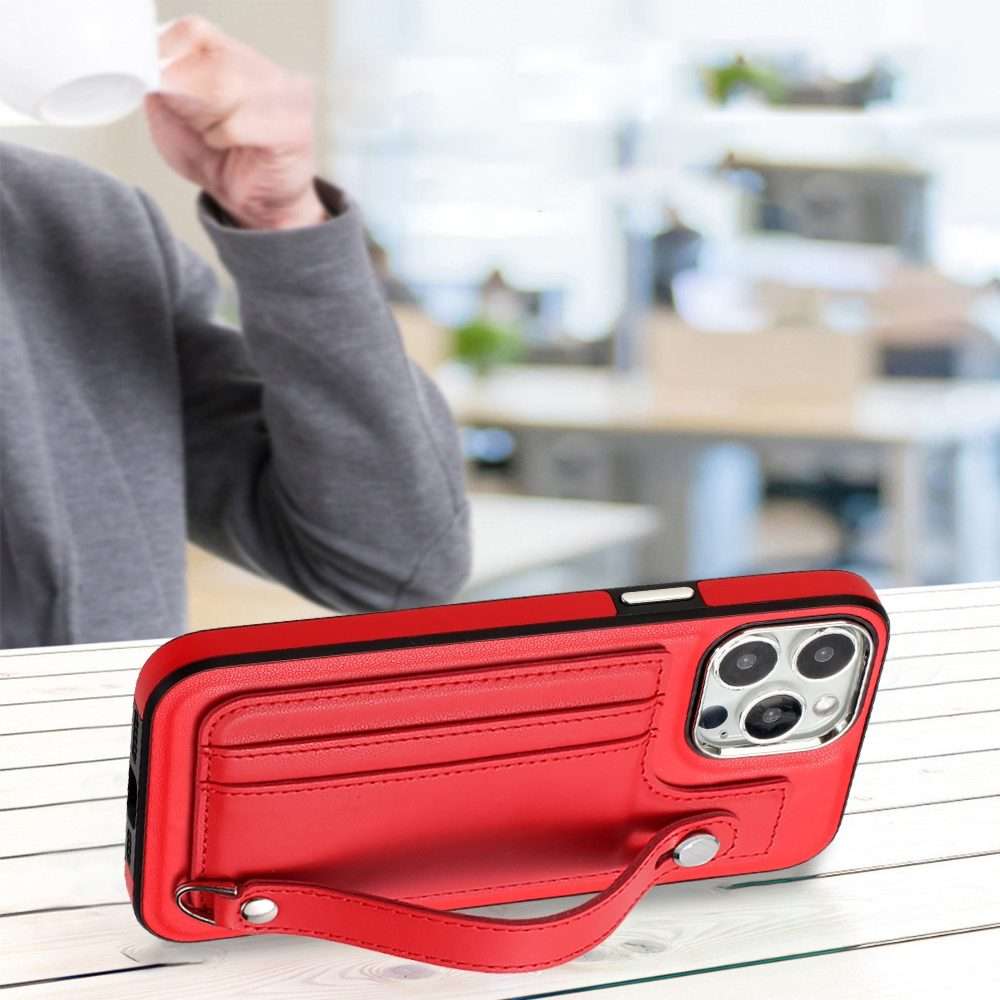 For iPhone 14 Pro Max Shockproof Leather Phone Case with Wrist Strap(Red)