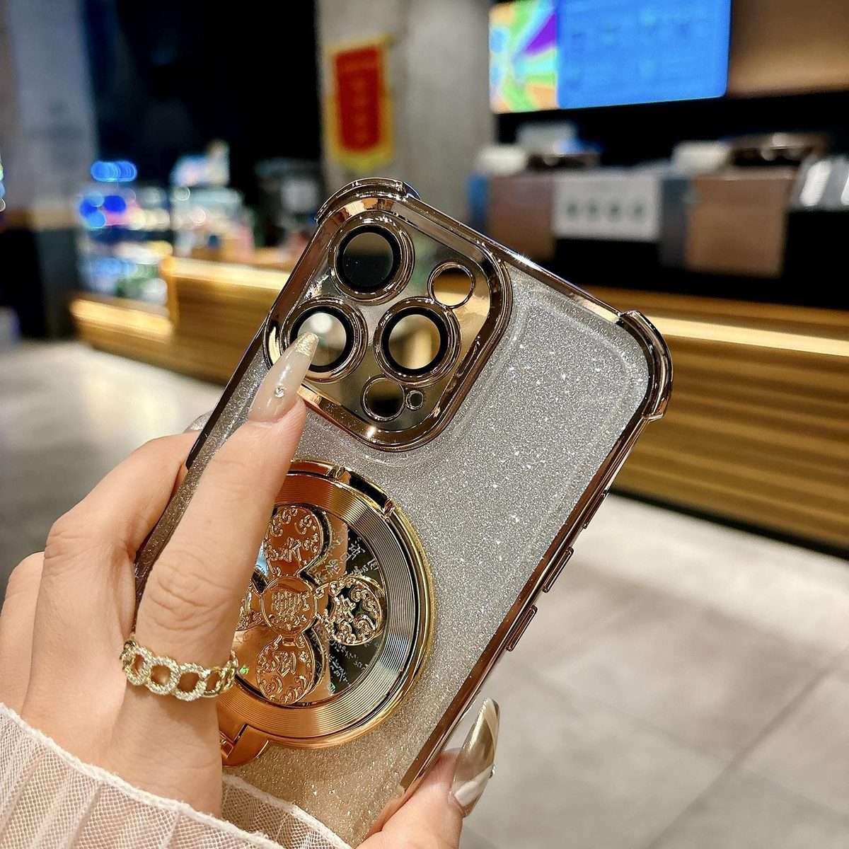 For iPhone 11 Pro Max Gradient Glitter Spinning Top Holder Phone Case(Gold)