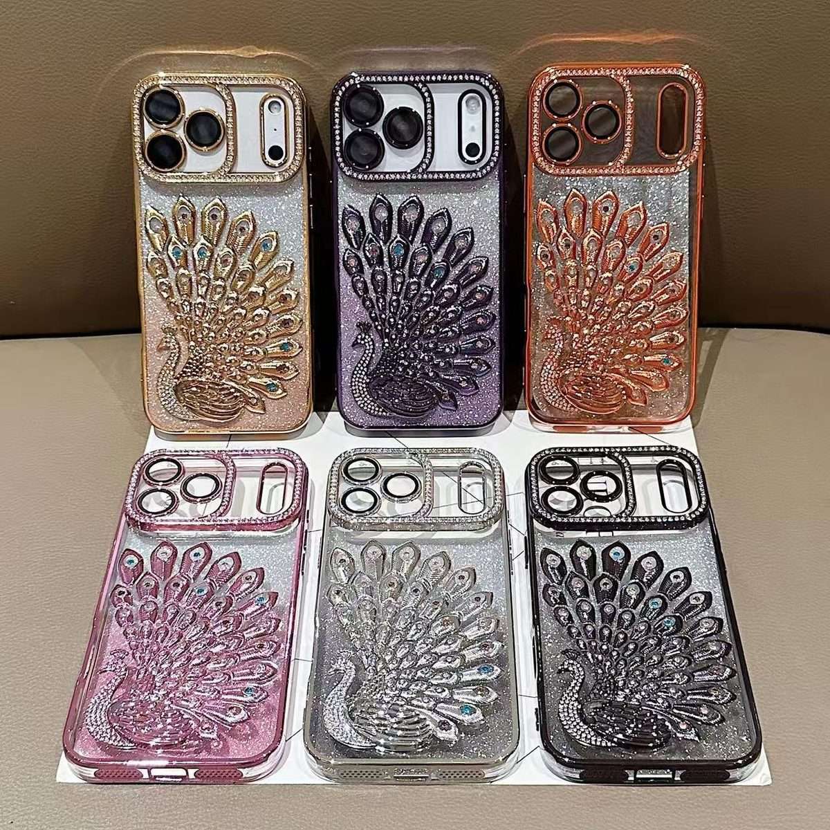 For iPhone 14 Pro Electroplated TPU Peacock Relief Rhinestone Glitter Phone Case with ... (Silver)