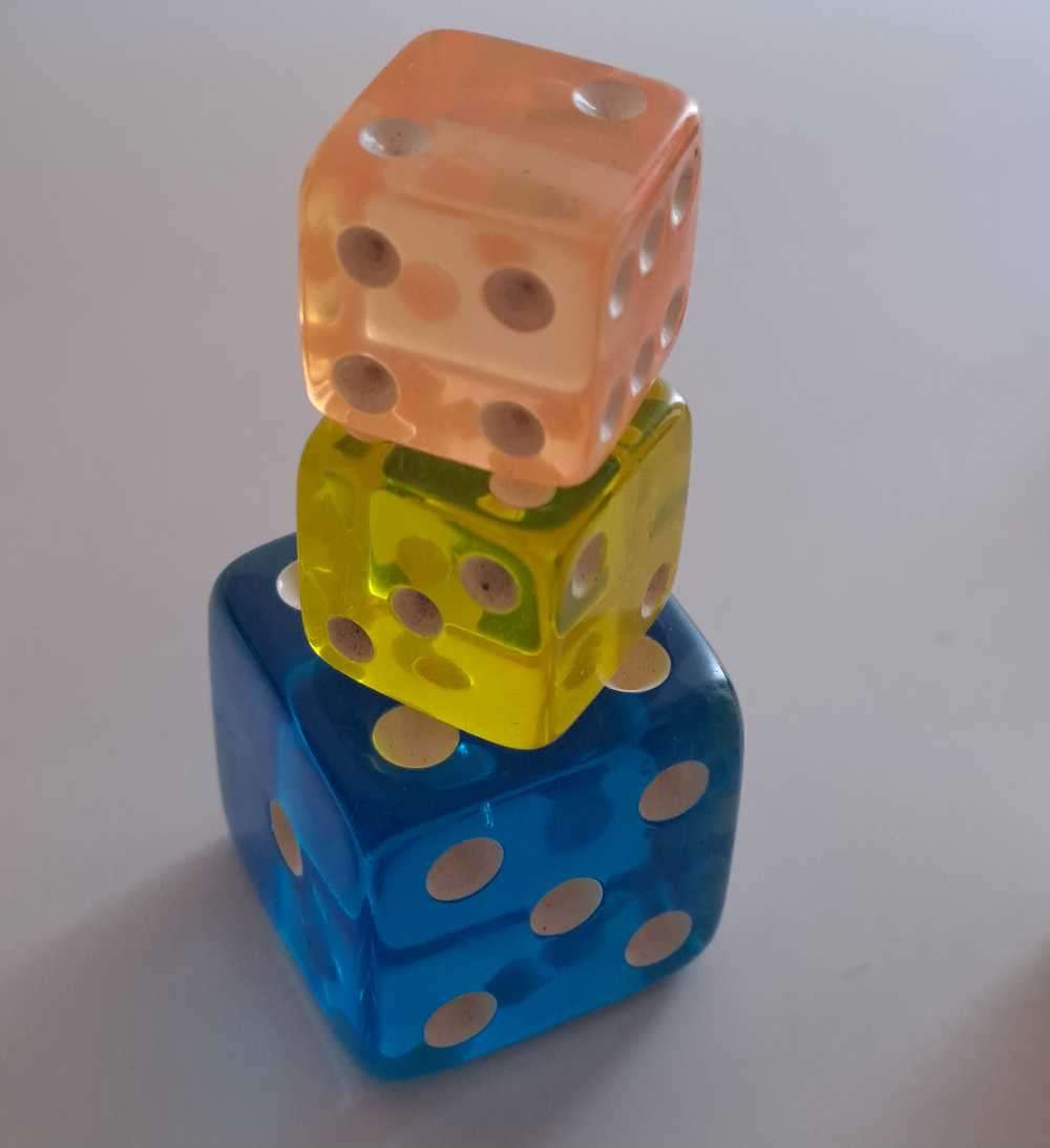 Dice collection of all colours and sizes. Some very unique pieces in wood, metal, and ceramic.