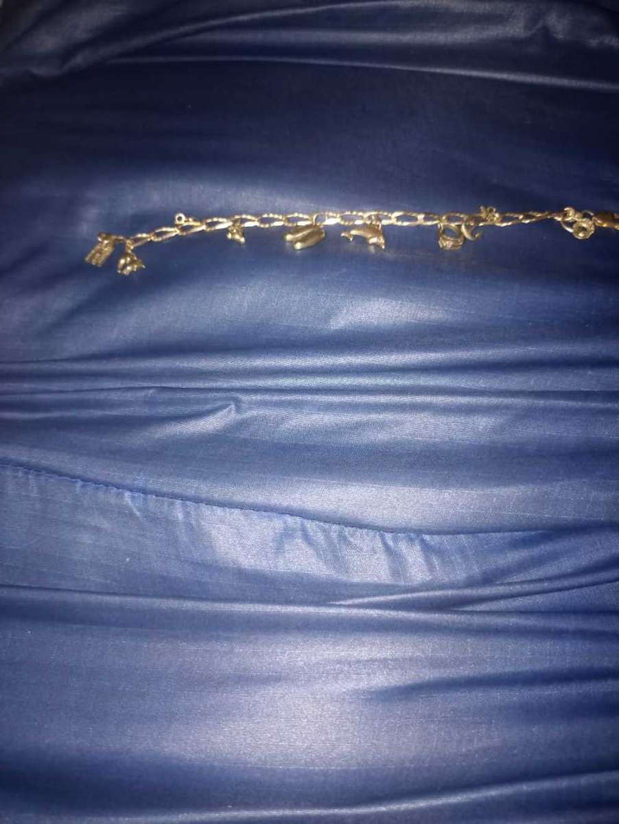 Ladies 9 carat gold charm bracelet