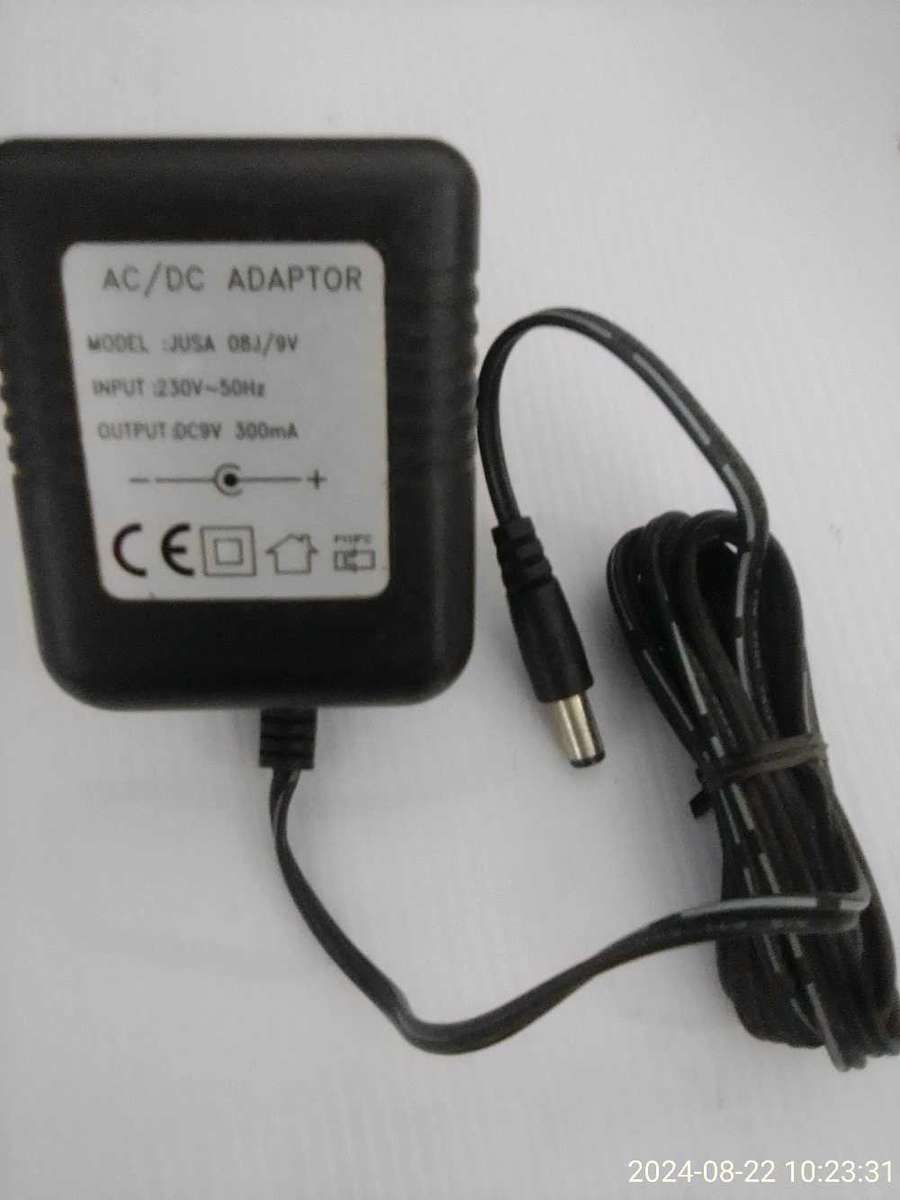 AC / DC ADAPTOR : 9 V  300mA.  MODEL :JUSA 08J/9v
